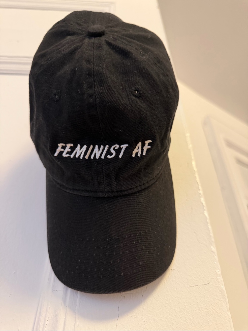 Port and Company Black Cap with "Feminist AF" Embroidery